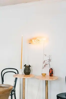 a table with a sign that reads the trust at Hart House a fresh 3 bedroom century home in Cherry Valley