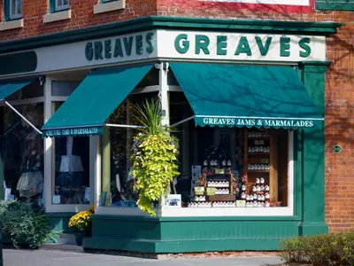 a store front with a green awning at Greaves Sweet Escape in Niagara on the Lake
