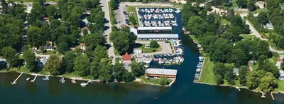 an aerial view of a harbor with boats in the water at Gilford Beach Apartment in Innisfil