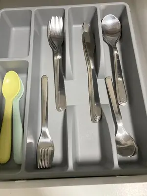 a tray with forks and spoons andbestosbestosbestosbestos at Brand New, cozy 2 Bdrm Bsmnt Apt in Mississauga