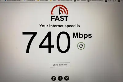 a laptop screen with a fast sign on it at Work From home with Parking WIFI and CN Tower View in Toronto