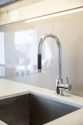 a kitchen sink with a faucet on top of it at Cozy 1 BR Air mattress CN Tower Ent District MTCC in Toronto