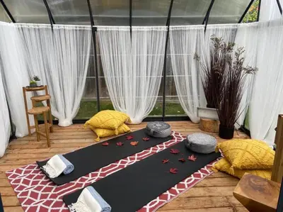 a room with a gazebo with white curtains at Beach House 5 Star Gem with a Muskoka room and Yoga Studio in Innisfil