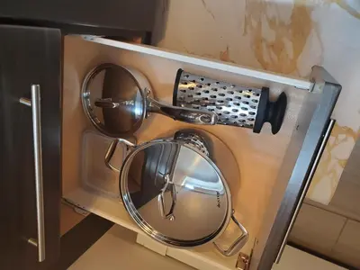 a pair of pots and pans in a microwave oven at The Cosmopolitan in Wortley Village in London