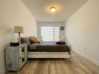 a small bedroom with a bed and a window at 3 Bedroom Well-designed Townhouse in Whitby in Whitby