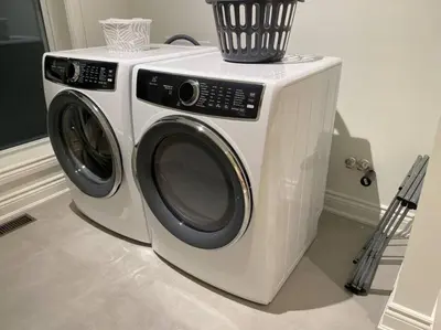 a washing machine with a basket on top of it at Downtown Picton 3 bedroom in Picton