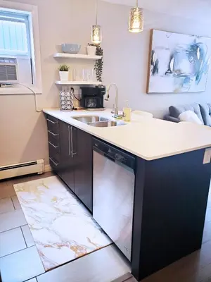a kitchen with a sink and a dishwasher at *NEW: Stylish Wortley 1BR Suite in London