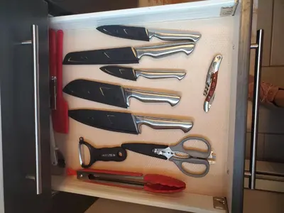 a refrigerator filled with lots of different types of scissors at *NEW: Stylish Wortley 1BR Suite in London