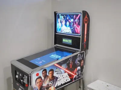 a video game system with a star wars game at Gateside Chalets Expansive 6 Bedroom Hot Tub Near Village Blue Mountain in Blue Mountains