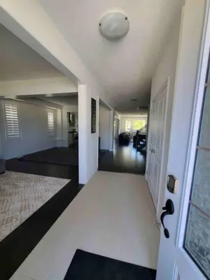 an empty hallway of a house with a hallway at Modern & Cozy Kawartha Getaway in Kawartha Lakes