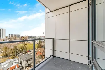 a balcony with a view of a city at Luxury 1BR King Bed Unit - Private Balcony in Kitchener