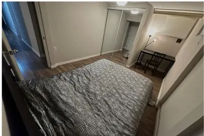 an overhead view of a room with a bed and a table at Cozy room near Pickering OPG in Pickering