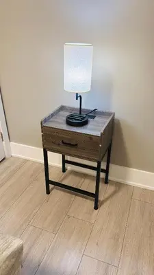a table with a lamp on top of it at Niagara Getaway across Fallsview in Niagara Falls