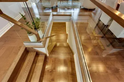a glass staircase with a potted plant on it at Luxurious and Spacious 4BR Home Near Downtown in Burlington
