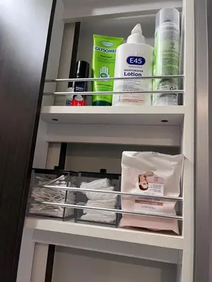 a closet filled with lots of products and towels at CN lovers in Toronto