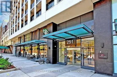 a store front of a building with glass windows at Cozy holiday home in Toronto