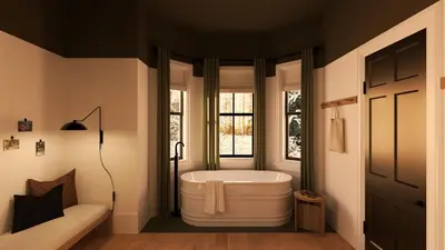 a bathroom with a bath tub and a window at Somewhere Inn Collingwood in Collingwood