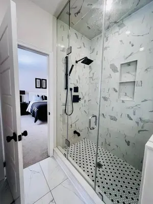 a shower with a glass door in a bathroom at Luxury Oakville Home, Hot Tub, Fireplace, New Home in Oakville