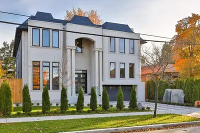 a white house with a lot of windows at Executive Room in Toronto next to Yorkdale shopping centre in Toronto