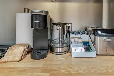 a blender sitting on top of a kitchen counter at Historic Victorian with Deck and Parking in Toronto
