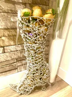 a vase filled with fruit sitting on a table at LOVE and Relax at Dream Catcher Retreat in Whitby