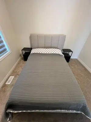 a large bed sitting in a room with at Niagara's entertainment house in Thorold
