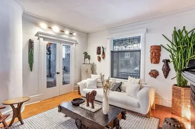 a living room with a couch and a table at Exquisite Luxury Estate - Steps to Downtown in Toronto