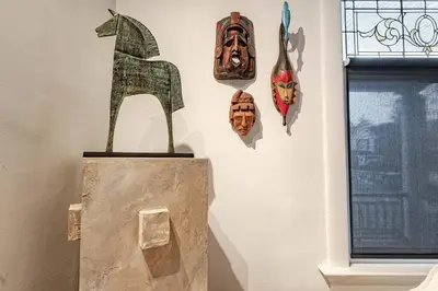 a group of masks hanging on a wall at Exquisite Luxury Estate - Steps to Downtown in Toronto
