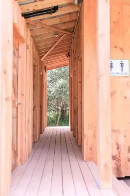 a wooden corridor in a house under construction at Homegrown Hideaway in Port Dover