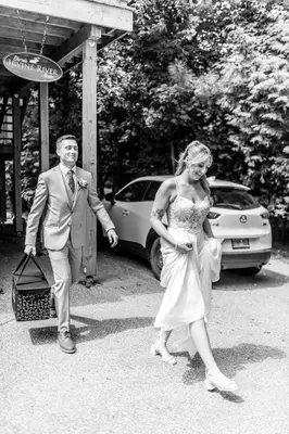 a man and a woman in a wedding dress at Elora’s Irvine River Suite in Elora