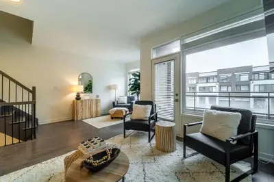 an apartment living room with a view of a building at Luxury Urban Town home in Oakville