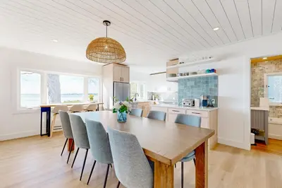 a kitchen and dining room with a table and chairs at 2889 Purvis Street in Innisfil