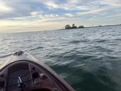a view from the front of a boat on a body of water at Beautiful tranquil centrally located condo in Collingwood