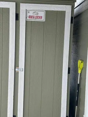 ajar door with a sign that readsjust lumber at The Fairway Flat in Collingwood