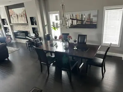 a dining room with a table and chairs at Stunning House 4 bed 2.5 bath in Kitchener