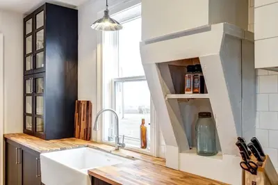 a kitchen with a sink and a window at From HGTV Marigold Suite in county farmhouse in West Lake