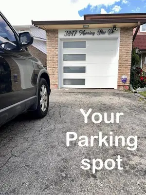 a car parked in front of a garage with the words your parking spot at Brand new single unit guest basement apartment in Mississauga