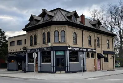 a building on the corner of a street at Cozy Studio Apt - Corktown Hamilton - Near DT in Hamilton