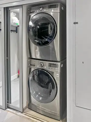 two washing machines stacked on top of each other at Hot Tub Haven in Toronto