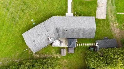 an overhead view of a house in a field at Deer Run Cottage- Golf Course cottage in Kawartha Lakes