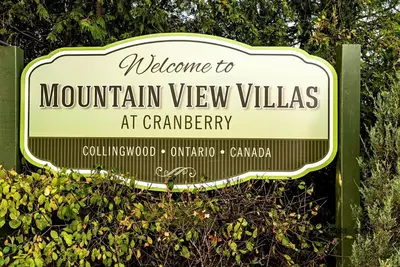 a sign for the mountain view villas at camparity at Mountain View Villas One Bed Loft Suite in Collingwood