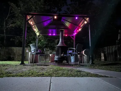 a gazebo with purple lights on it at Tiny Wood Cottage 17 in Wasaga Beach