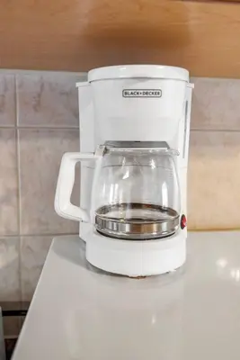 a food processor sitting on top of a counter at Relaxing Lakefront Cabin in Bailieboro