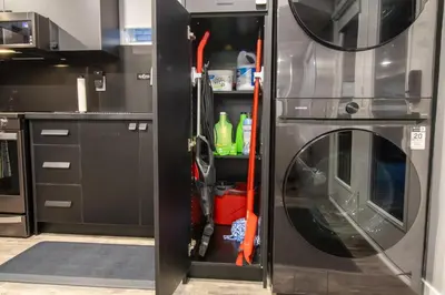 a kitchen with a washer and dryer at The Gate Chic & Cozy Basement Retreat in Ajax in Ajax