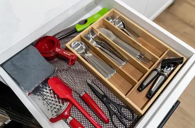 a drawer filled with utensils in a drawer at Modern 3 Bdr Homeapt Mins To Notlwineriesfalls in St. Catharines