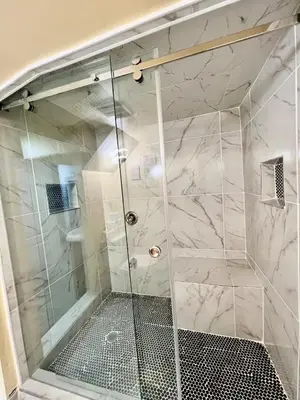 a shower with a glass door in a bathroom at Private Room Near Airport K8 in Mississauga