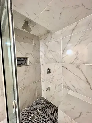 a bathroom with a shower with a glass door at Private Room Near Airport K6 in Mississauga