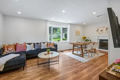 a living room with a couch and a table at Queenston Cottage in Queenston