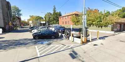 a group of cars parked in a parking lot at Charming Basement Suite with Private Entrance Near Subway, Koreatown & UofT in Toronto