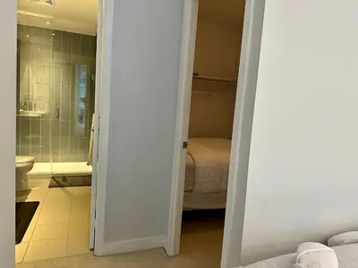 a bathroom with a shower and a toilet and a sink at Cityview in the Sky 2Bdrms 2Baths 5realbeds in Toronto